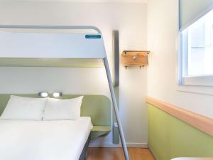 Posteľ alebo postele v izbe v ubytovaní Ibis Budget Madrid Centro Las Ventas