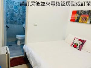 Postel nebo postele na pokoji v ubytování Kenting Bayview Hotel