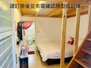 Postel nebo postele na pokoji v ubytování Kenting Bayview Hotel
