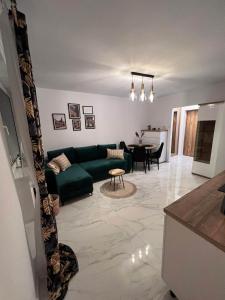 O zonă de relaxare la Piła- balkon-3 osoby-2 łóżka-przytulny apartament
