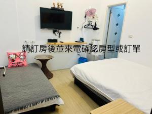 Postel nebo postele na pokoji v ubytování Kenting Bayview Hotel