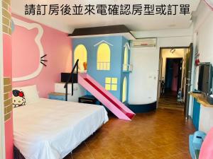 Postel nebo postele na pokoji v ubytování Kenting Bayview Hotel
