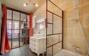 a bathroom with a sink and a shower at Red & Bleue YourHostHelper in Cannes