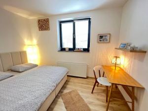 Posteľ alebo postele v izbe v ubytovaní Penzion 7 pokojů