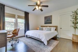 a bedroom with a bed and a ceiling fan at Pet-Friendly Cincinnati Retreat with Hot Tub in Blue Ash