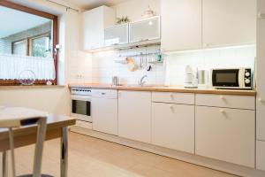 Kuchyň nebo kuchyňský kout v ubytování Sonnenschein, Ferienwohnung