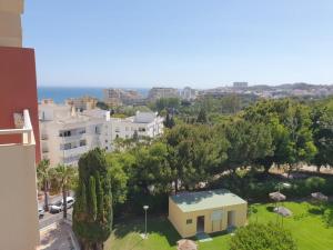 a view of a city with trees and buildings at JP - 3.0 in Benalmádena