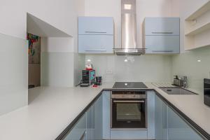 Kuchyň nebo kuchyňský kout v ubytování Villa Veronika Apartments