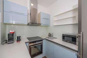 Kuchyň nebo kuchyňský kout v ubytování Villa Veronika Apartments