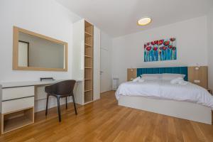 Postel nebo postele na pokoji v ubytování Villa Veronika Apartments