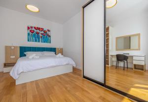 Postel nebo postele na pokoji v ubytování Villa Veronika Apartments