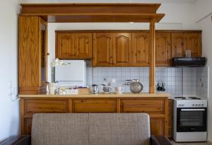 ครัวหรือมุมครัวของ Costas apartment +7 ภาพ