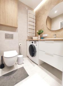 Kúpeľňa v ubytovaní Mogilska 120D by Homeprime + 36 fotografií
