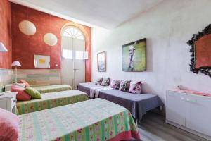 Postel nebo postele na pokoji v ubytování Cortijo EL LLANO + 41 fotografií