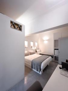 Voodi või voodid majutusasutuse Aggelikoula Rooms toas