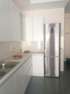 Kuchyň nebo kuchyňský kout v ubytování Fenicottero Rosa