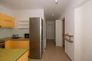 Kuchyň nebo kuchyňský kout v ubytování Villa Veronika Apartments