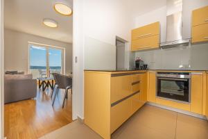 Kuchyň nebo kuchyňský kout v ubytování Villa Veronika Apartments