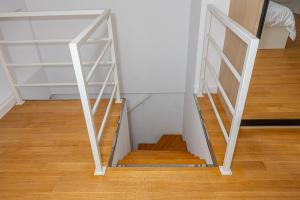 Palanda nebo palandy na pokoji v ubytování Villa Veronika Apartments