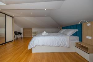 Postel nebo postele na pokoji v ubytování Villa Veronika Apartments