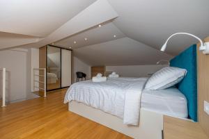 Postel nebo postele na pokoji v ubytování Villa Veronika Apartments