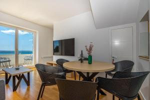 TV a/nebo společenská místnost v ubytování Villa Veronika Apartments