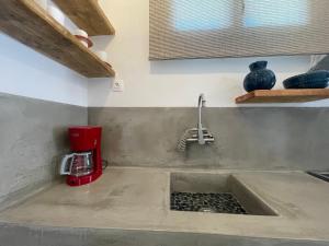 Kuchyň nebo kuchyňský kout v ubytování Amarienitas Suites