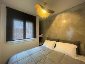 Postel nebo postele na pokoji v ubytování Amarienitas Suites