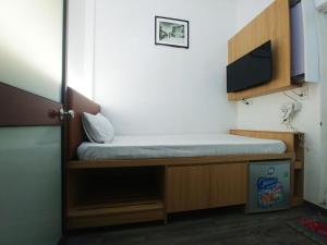 TV a/nebo společenská místnost v ubytování Hanoi Discovery Hotel + 8 fotografií