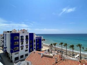 a view of the beach from the balcony of a hotel at Perla Marina in Nerja