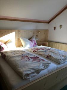 Cama ou camas em um quarto em Waldhaus