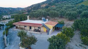 an aerial view of a house with a roof at Lithines Villa go green in Dhafnés