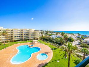 an aerial view of a resort with a swimming pool at Luxury Apart wStunning Sea Views, Walk Beach in Albufeira