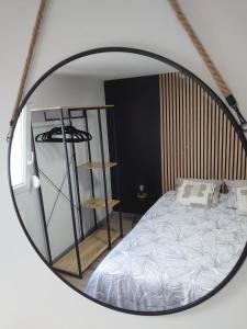Posteľ alebo postele v izbe v ubytovaní Charmant appartement à Gérardmer