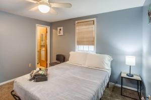 a bedroom with a large white bed in a room at Centric Ranch in the South ave by Dwtn/UofR/Arpt in Rochester