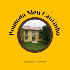 ein gelbes Schild, das spanischer neuer Herausforderer liest in der Unterkunft Pousada Meu Cantinho in Conservatória