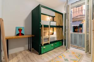Posteľ alebo postele v izbe v ubytovaní The Urban Jungle Hostel