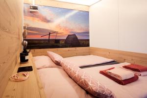 A bed or beds in a room at Tiny Zwick