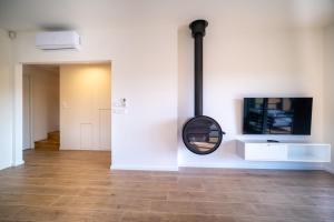 TV a/nebo společenská místnost v ubytování Holiday House U Hájenky 11P Lipno Home