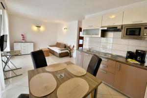Kuchyň nebo kuchyňský kout v ubytování Apartments Jasmina
