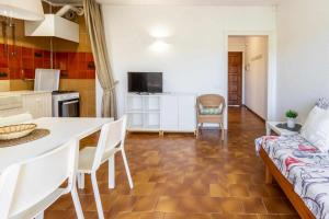 Kuchyňa alebo kuchynka v ubytovaní Cubells 2 Apartamento cercano a la playa