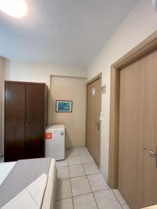 Posteľ alebo postele v izbe v ubytovaní Hotel Afrodite