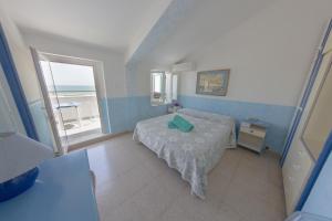Postel nebo postele na pokoji v ubytování Hotel Venezia New + 37 fotografií