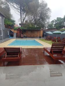 Departamentos Huelten Villa Gesell 내부 또는 인근 수영장