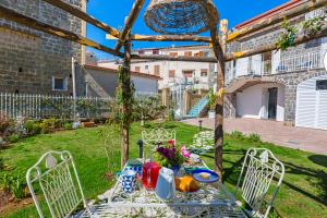 Zahrada ubytování YourHome - Relais Loggia Li Galli