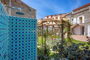 Zahrada ubytování YourHome - Relais Loggia Li Galli