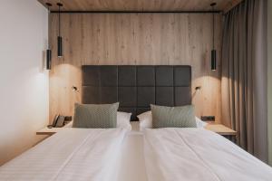Voodi või voodid majutusasutuse FIRSTpeak Chalets toas