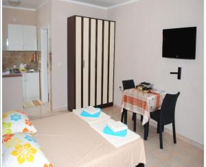 TV a/nebo společenská místnost v ubytování Apartments Anne