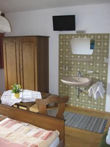 Postel nebo postele na pokoji v ubytování Haus Steinlechner