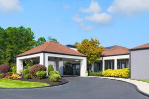 a rendering of a house with a driveway at Courtyard by Marriott Augusta in Augusta